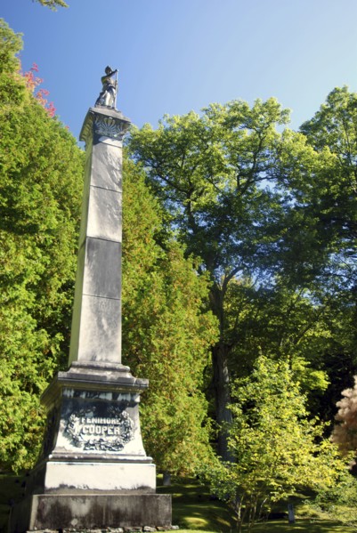 USA, New York State, Cooperstown, "Monument to James Fenimore Cooper topped with statue of Natty