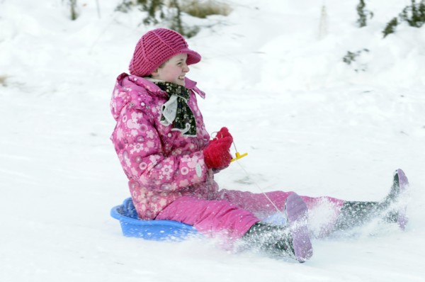 WEATHER, Winter, Snow, "Young girl sledding down hill. Perth, Scotland. "