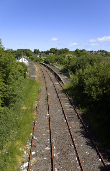 Transport, Railway, Disused track and platform in country village.