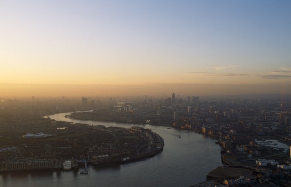 England, London, Canary Wharf, View over the City of London from Canada Tower in a  haze of smog at
