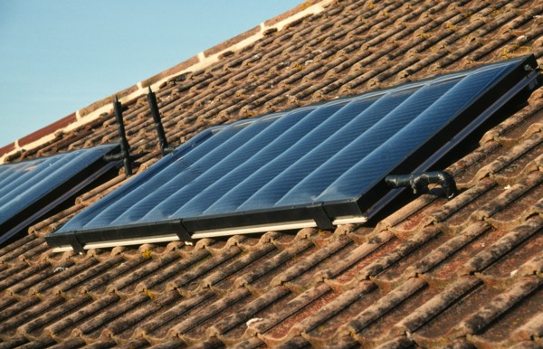 Environment, Energy, Solar Power, Solar panels on the roof of a house.