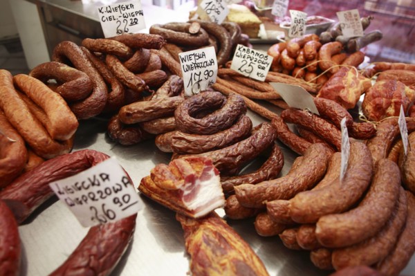 Poland, Krakow, display of cold meats in Stary Kleparz market.