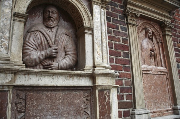 Poland, Krakow, bas reliefs of Georgius Laubacensis & Anna Petri on the outside of St Barbara's