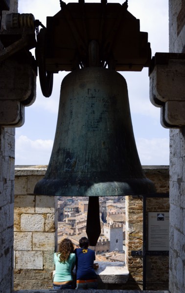 ITALY, Tuscany, Siena, Palazzo Publico Two young tourists at the top of the Torre del Mangia