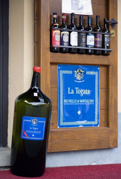 ITALY, Tuscany, Montalcino, Val D'Orcia Brunello di Montalcino Enoteca or wine shop with dispaly of