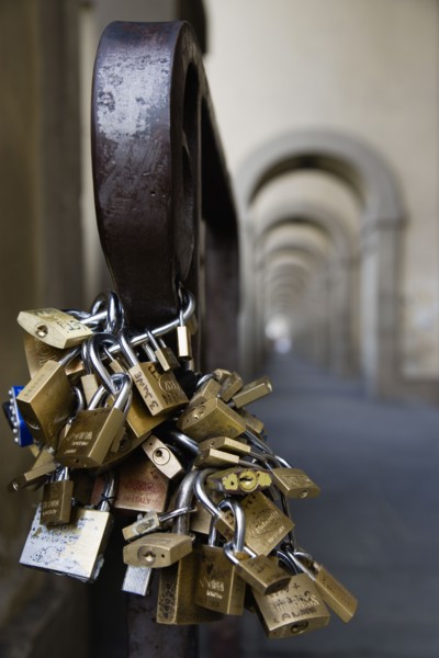 ITALY, Tuscany, Florence, Bunches of locked padlocks used by stallholders in the Vasari Corridor