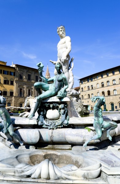 ITALY, Tuscany, Florence, The 1575 Mannerist Neptune fountain with the Roman sea God surrounded by