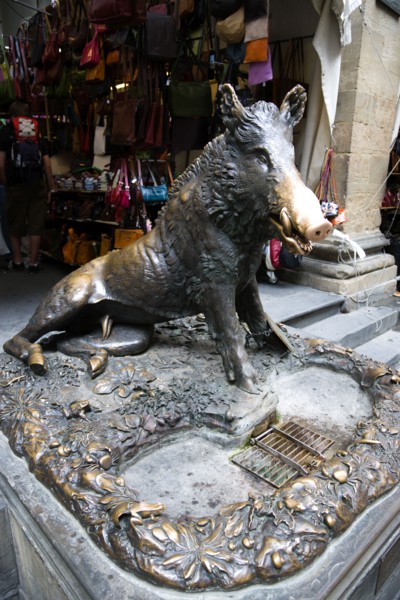ITALY, Tuscany, Florence, The 17th century bronze fountain called Il Porcellino in the Mercato