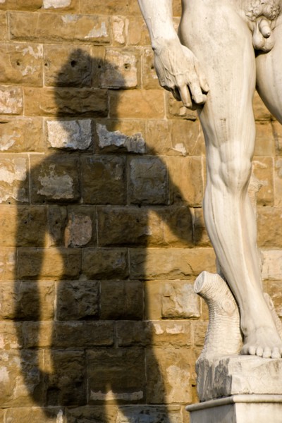 ITALY, Tuscany, Florence, Shadow of the replica Rennaisance statue of David by Michelangelo on the