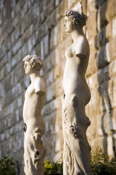ITALY, Tuscany, Florence, Armless male and female statues outside the Palazzo Vecchio in the Piazza