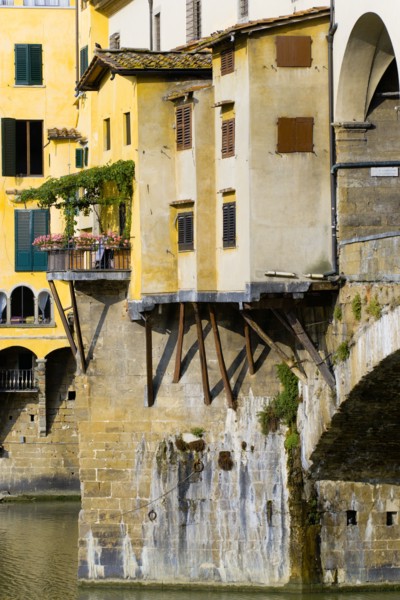 ITALY Tuscany Florence Ponte Vecchio medieval bridge across River Arno. View of merchant's shops
