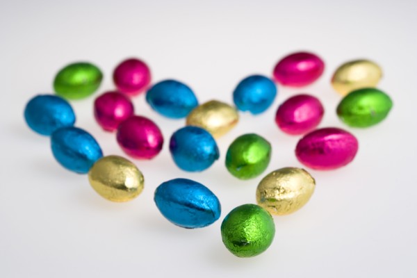 Food, Sweets, Chocolate, Colourful foil wrapped Easter eggs in the shape of a Valentine heart on a