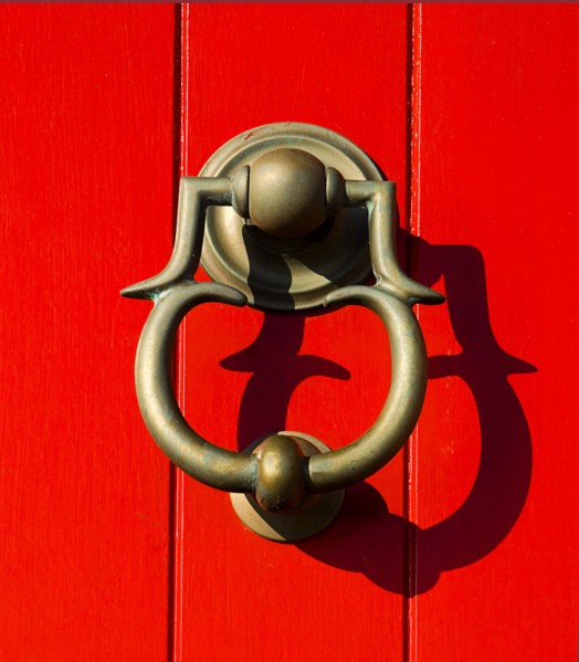 IRELAND, County Dublin, Howth Harbour, Detail of door knocker on lighthouse.
