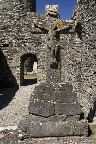 IRELAND, County Louth, Monasterboice Monastic Site, Crucifixion scene in stone situated in church