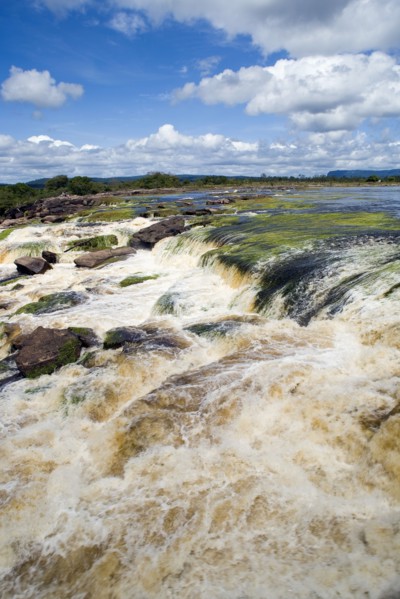 VENEZUELA, Bolivar State, Canaima National Park, Canaima Village, river flowing into Canaima lagoon