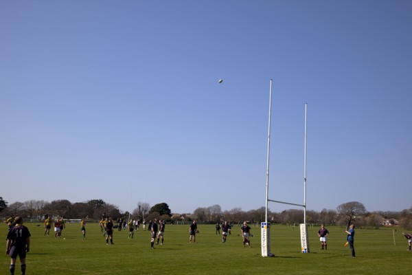 England, West Sussex, Shoreham-by-Sea, Rugby Teams playing on Victoria Park playing fields.