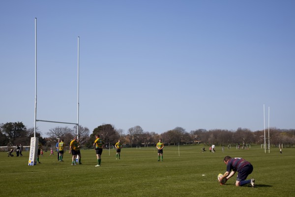 England, West Sussex, Shoreham-by-Sea, Rugby Teams playing on Victoria Park playing fields. Player