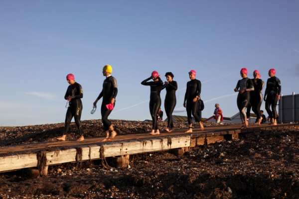 England, West Sussex, Goring-by-Sea, Worthing Triathlon 2009, female competitors making their way