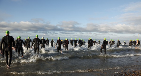 England, West Sussex, Goring-by-Sea, Worthing Triathlon 2009, male competitors at the swim start.
