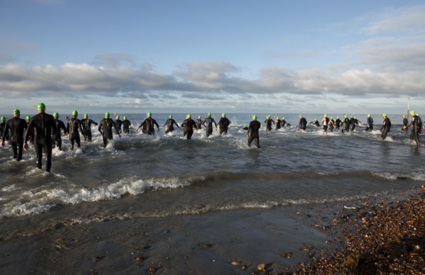 England, West Sussex, Goring-by-Sea, Worthing Triathlon 2009, male competitors at the swim start.