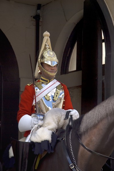 England, London, The Mall, Horse Guards Parade, guardsman on horse in full uniform.