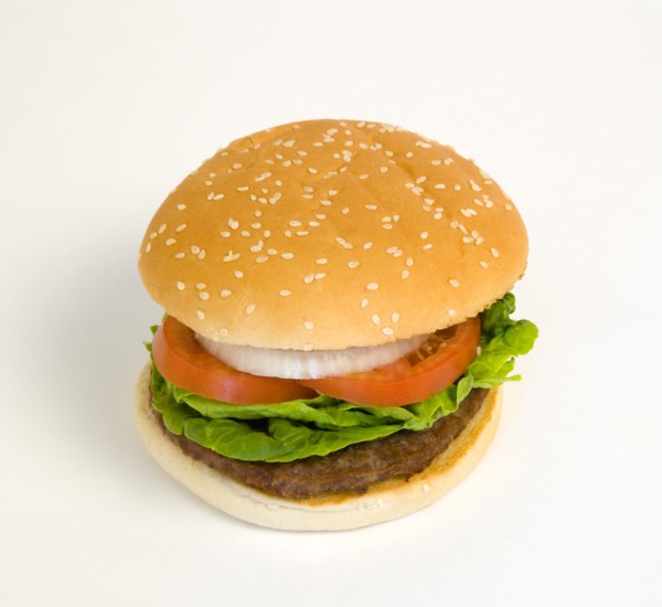Food, Cooked, Hamburger, Single quarter pound burger with onoin tomato and lettuce in a bun on a