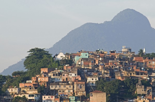 Rio de Janeiro, Brazil. Favela or slum above Saude neighbourhood brick houses trees Church and