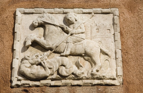 Venice, Veneto, Italy. Centro Storico Wall plaque on Venetian facade with relief carving depicting