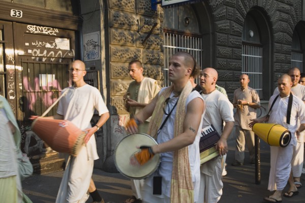 Budapest, Pest County, Hungary. Hare Krishna devotees singing and dancing on Andrassy UtIn Pest
