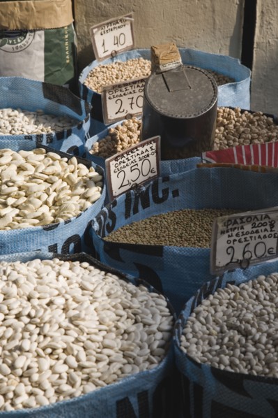 Athens, Attica, Greece. Sacks of beans for sale displayed on market food stall. Greece Greek Europe