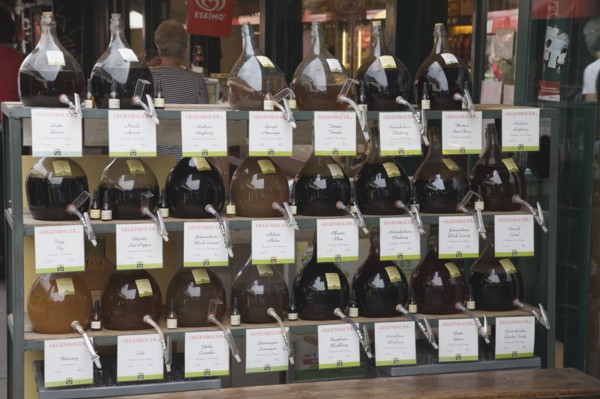 Vienna, Austria. The Naschmarkt. Display of Federweisser wine in the fermentation stage known as