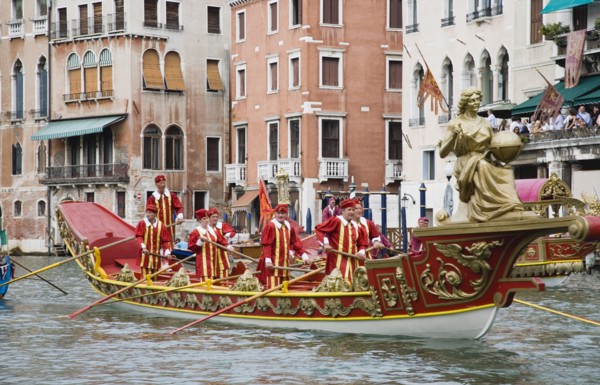 Venice, Veneto, Italy. Participants in the Regata Storico historical regatta held annually in