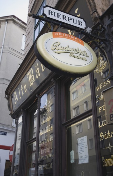 Vienna, Austria. Angled view of pub facade with hanging beer signs. Austria Austrian Republic