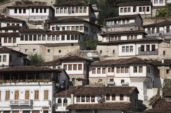 Albania, Berat, Traditional Ottoman buildings on hillside in old town.