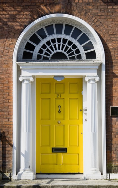 Ireland, County Dublin, Dublin City, Yellow Georgian door in the city centre south of the Liffey