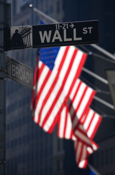 USA, New York, New York City, Manhattan  Road signs for Wall Street and Broad Street with American