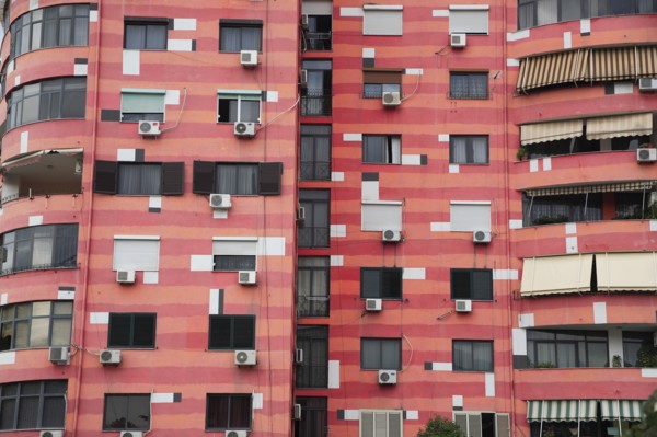 Albania, Tirane, Tirana, Part view of exterior facade of colourful apartment building with