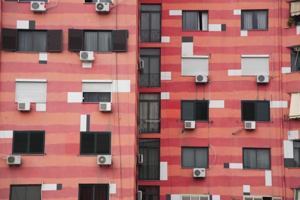 Albania, Tirane, Tirana, Part view of exterior facade of colourful apartment building with