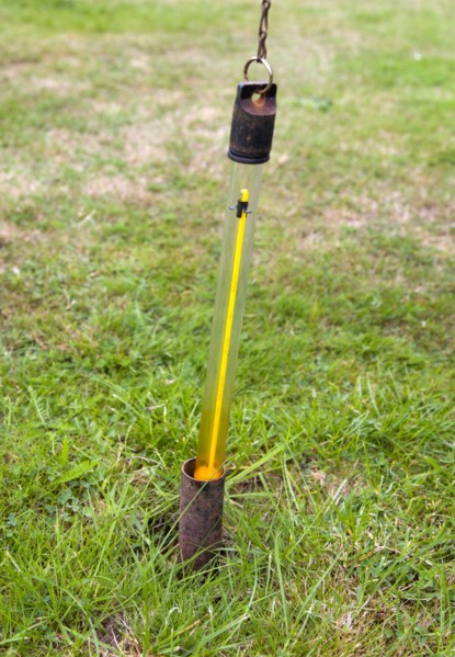 Climate, Weather, Measurements, Thermometer for measuring ground temperature being removed from a