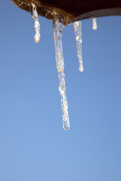 Weather, Winter, Ice, Icicles hanging from household facia panel.