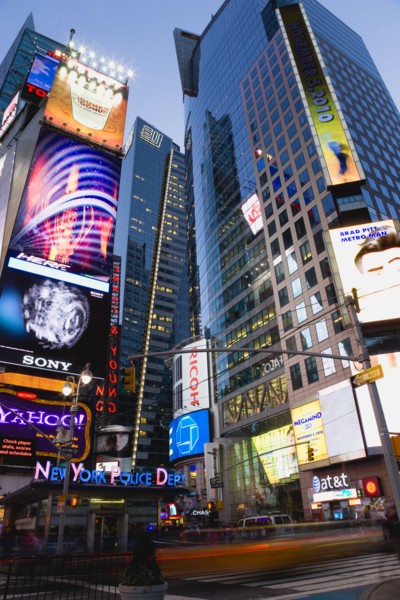 USA, New York, New York City, Manhattan  People walking at night in Times Square at the junction of