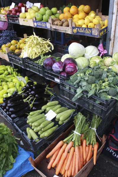 Albania, Tirane, Tirana, Display of fruit and vegetables including aubergines  carrots and cabbage