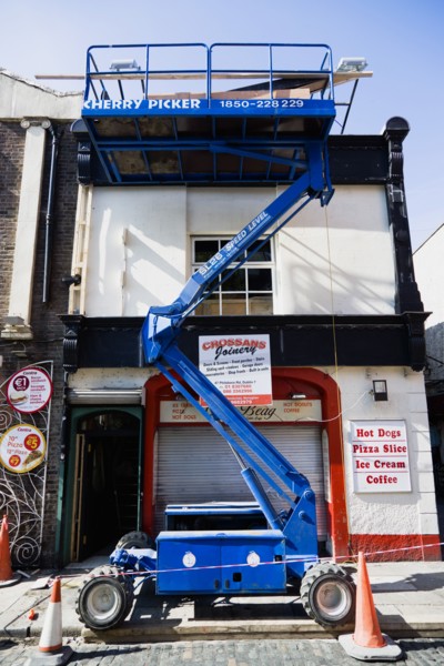 Ireland, County Dublin, Dublin City, Raised hydraulic cherry picker platform used by decorators