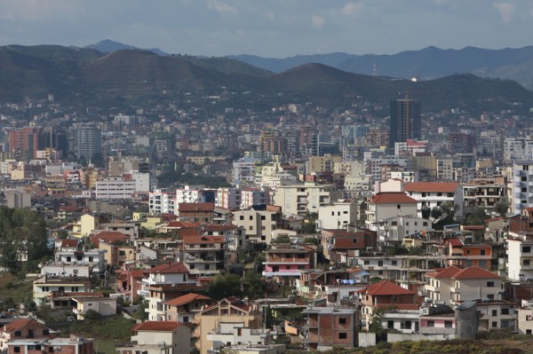 Albania, Tirane, Tirana, View across residential buildings to the hillside beyond.