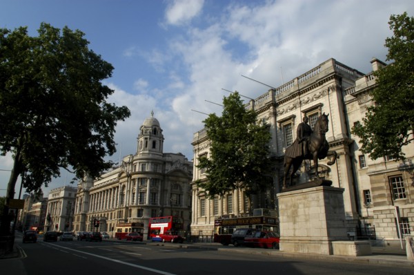 England, London, Whitehall streetscene with equestrian statue of Earl Haig in the foreground