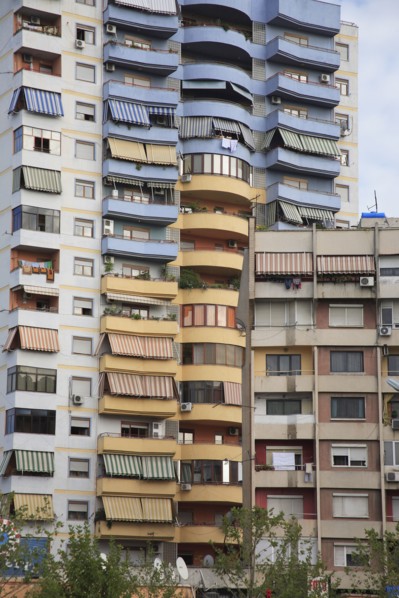 Albania, Tirane, Tirana, Part view of exterior facade of apartment block.