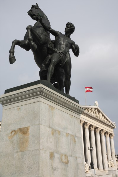 Bronze statue of a horse tamer a symbol for the suppression of passion by Joseph Lax in front of