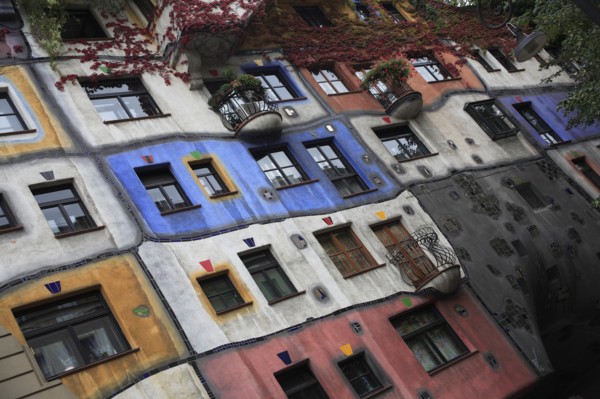 The Hundertwasser-Krawinahaus angled part view of exterior facade of apartment building. Photo: