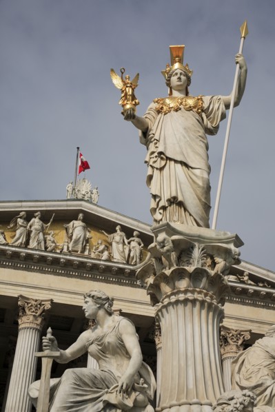 Statue of Athena raised on pillar above fountain in front of the Parliament building. Photo: