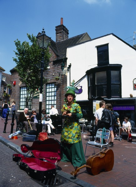 England, East Sussex, Brighton, The Lanes Busker in Market Square During Brighton Festival. 
Photo